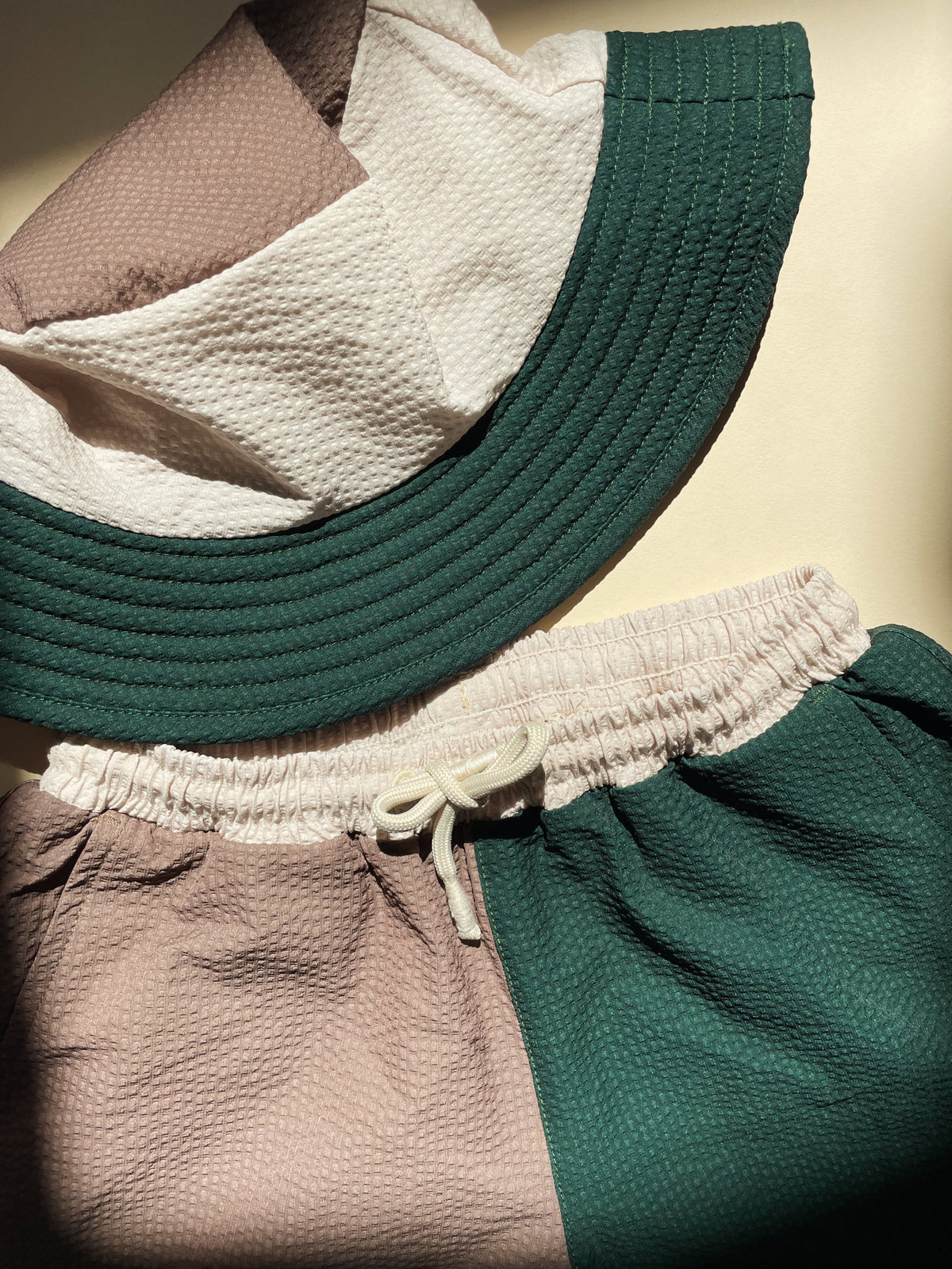 KONGES SLOJD SEER ASNOU SWIM SHORTS / pinel grove shitake french oak